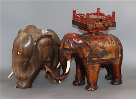 A Japanese lacquer elephant and a wooden elephant tallest 30cm